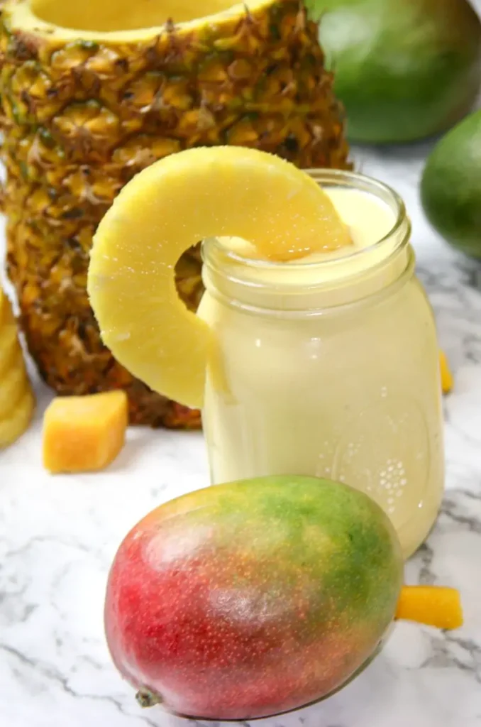 Recipe to make vegan mango pina coladas.