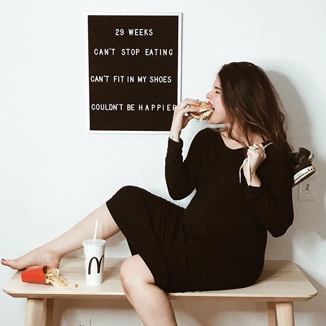 Letter board that says "29 weeks can't stop eating can't fit in my shoes couldn't be happier"