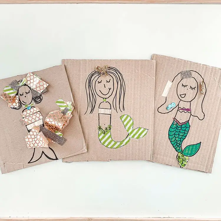 Craft where you draw and decorate mermaids on cardboard